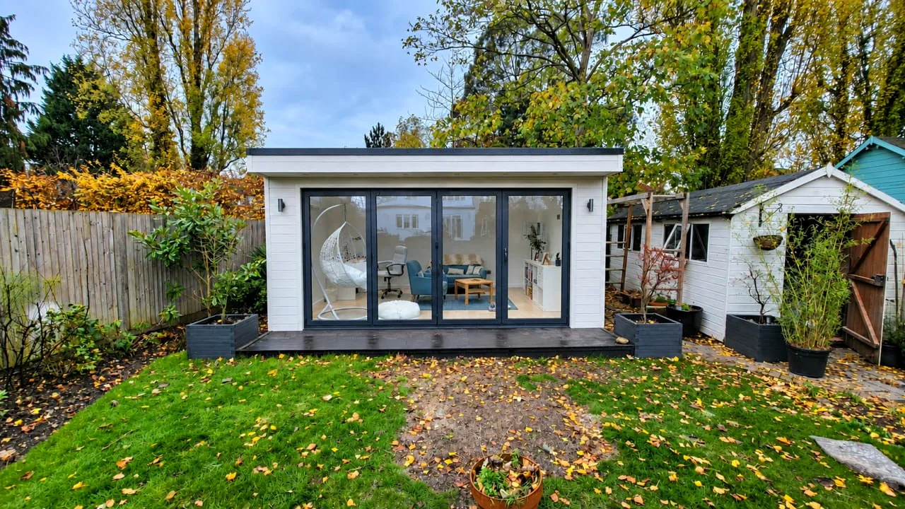 Bright contemporary garden building in a landscaped setting